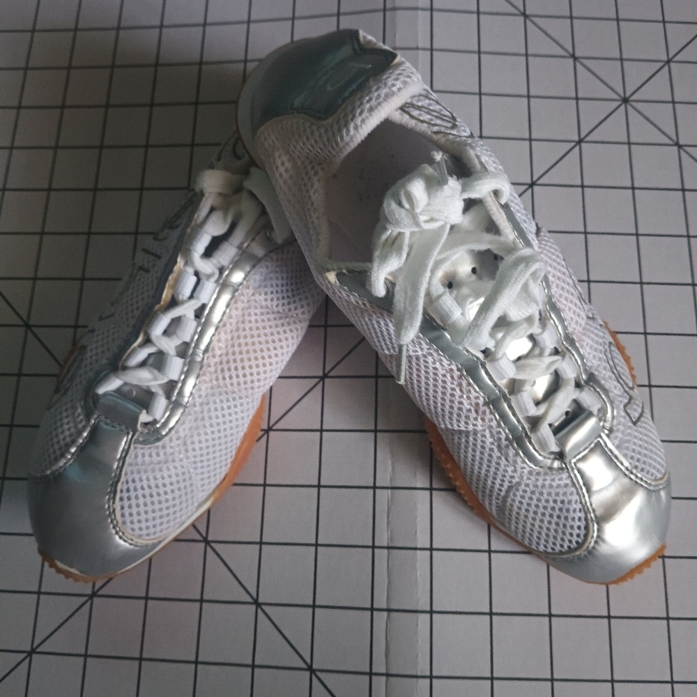 Designer tennis shoe by Bebe 👟